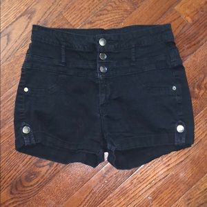 Black high waisted shorts with gold buttons
